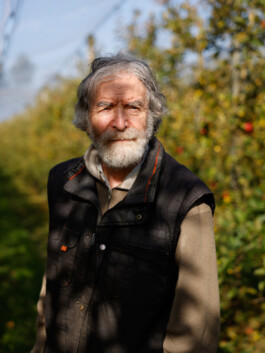Portrait bei der Ernte; Landwirtschaft, Fotograf